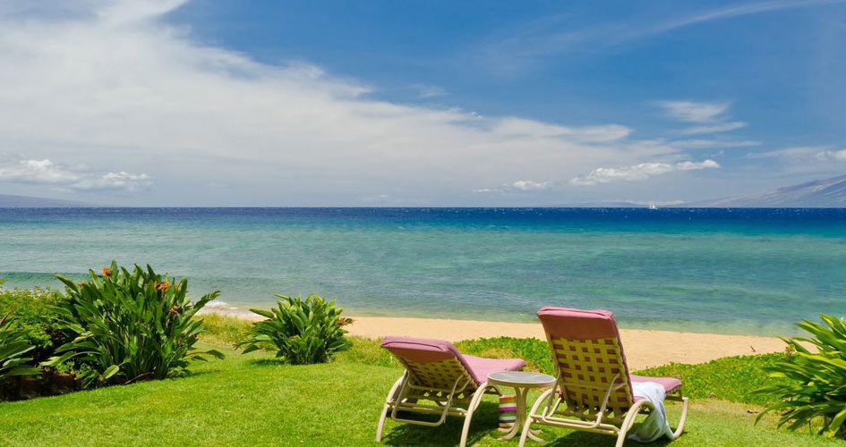 Sanibel-Captiva lounge chairs overlooking the beach